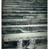 image of boots at the bottom of a set of stairs