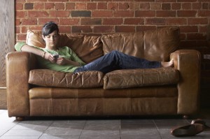 girl on couch with phone