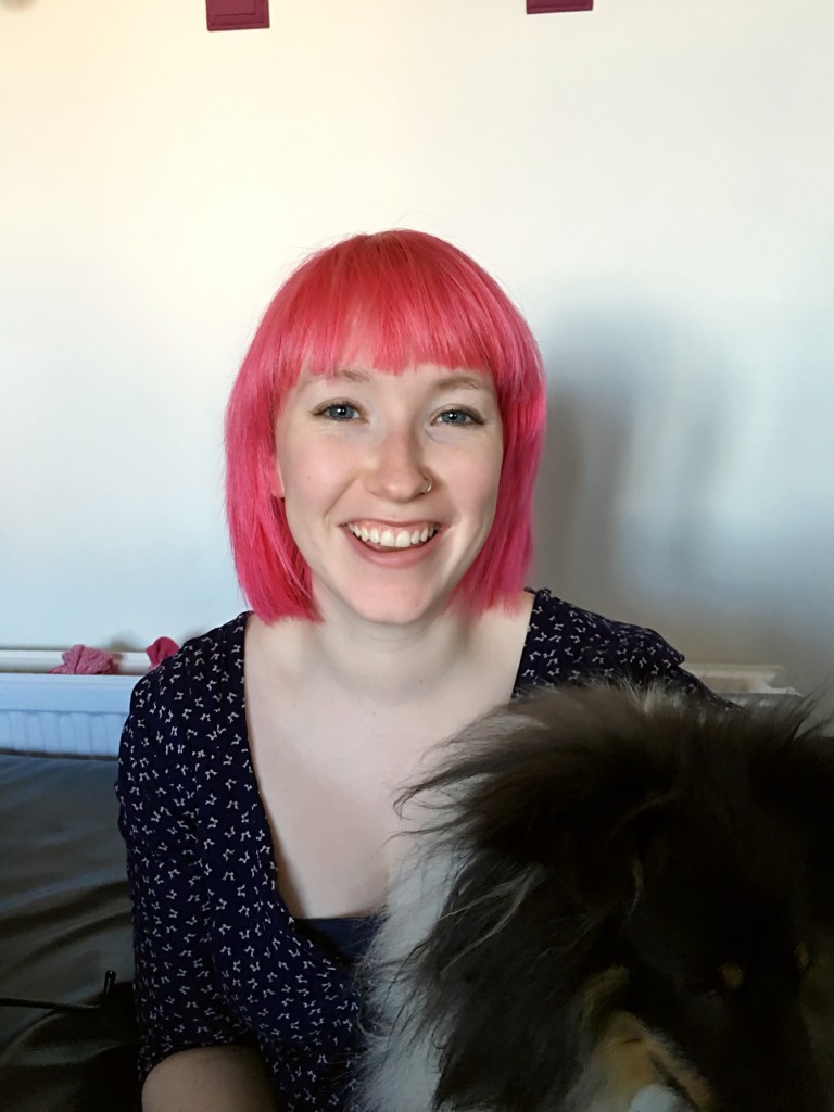 Emma, with pink hair